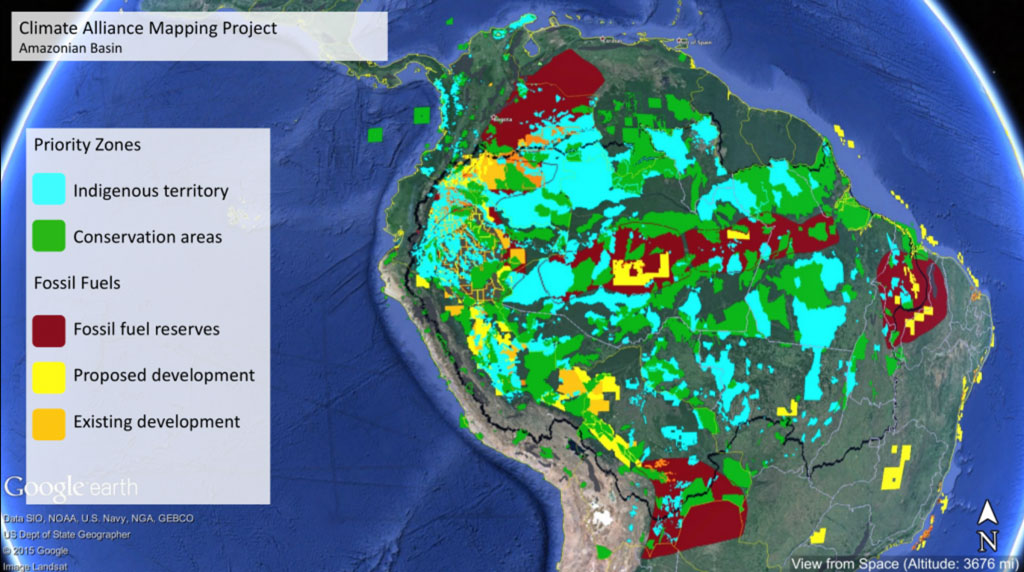 Map of South America showing priority zones of Indigenous territory and conservation area, as well as proposed and existing development and fossil fuel reserves.